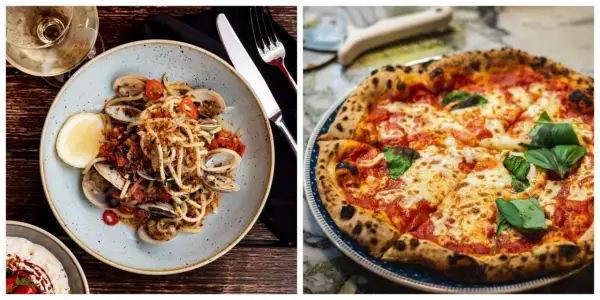 En tallrik spaghetti med musslor och en klassisk italiensk pizza med basilika.